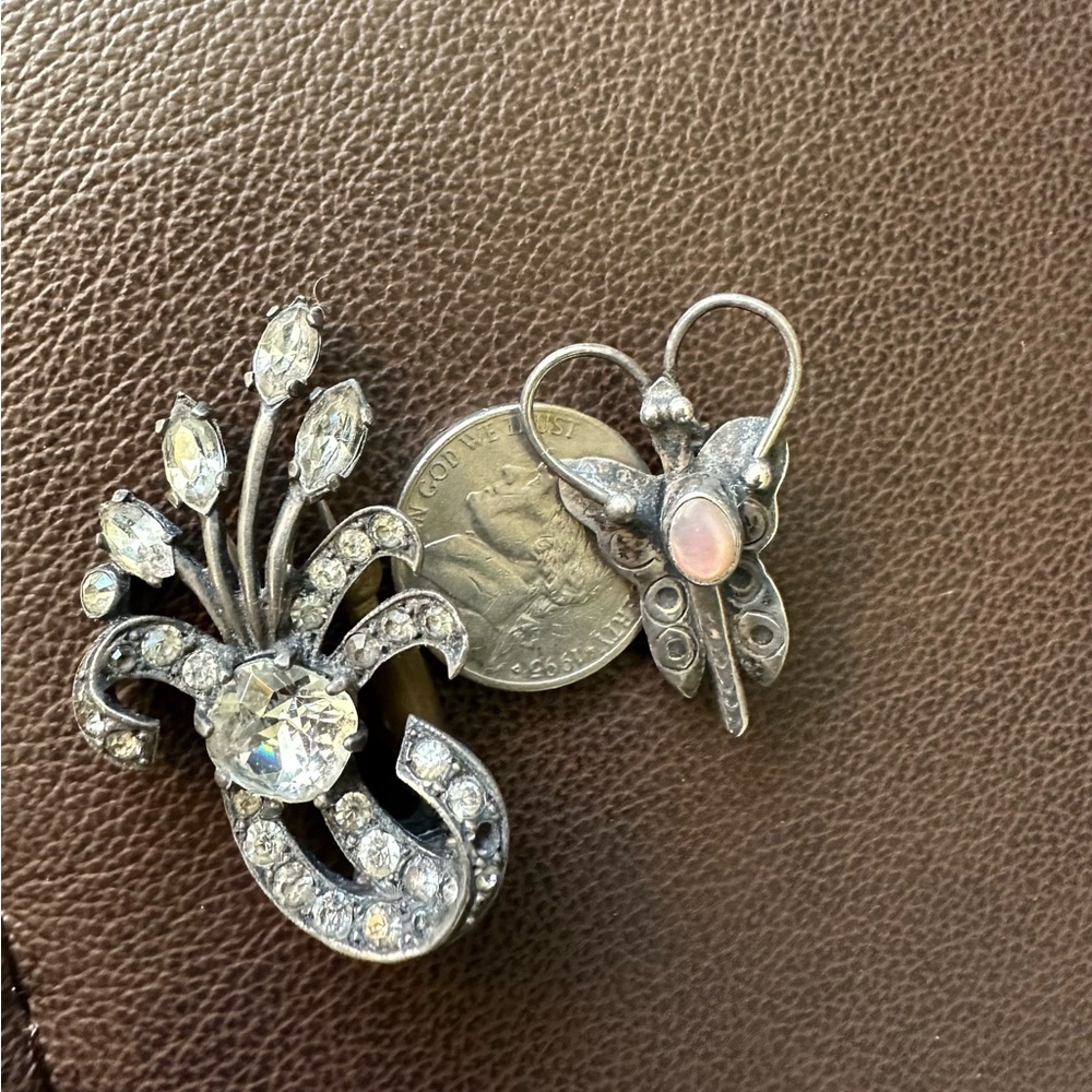 2 Sterling silver Brooches.